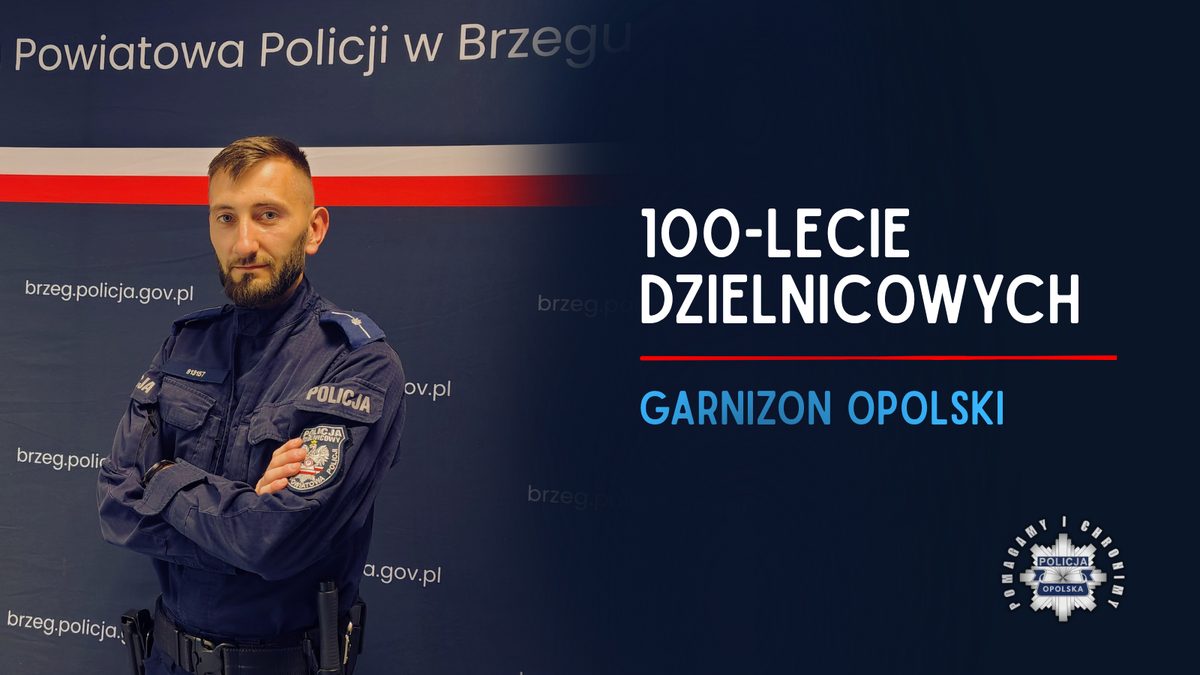 policjant na granatowej ściance